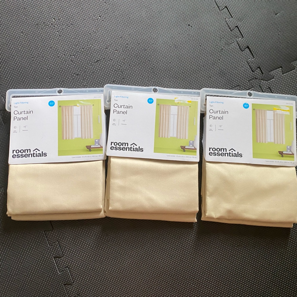 Brand new room essentials light filtering curtains -tan. 63”
